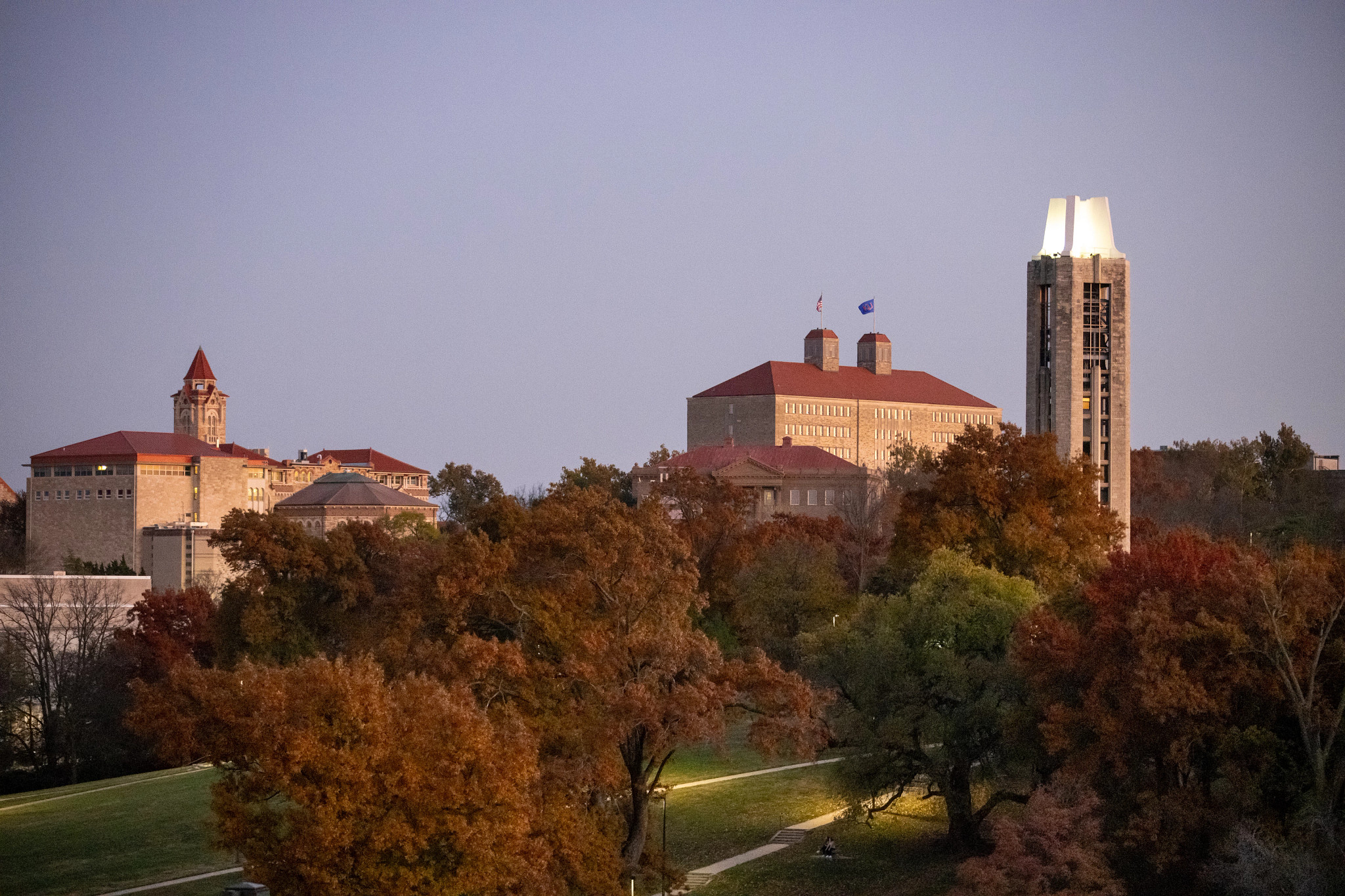 campanile in the foreground with fraser and dyche halls in the background